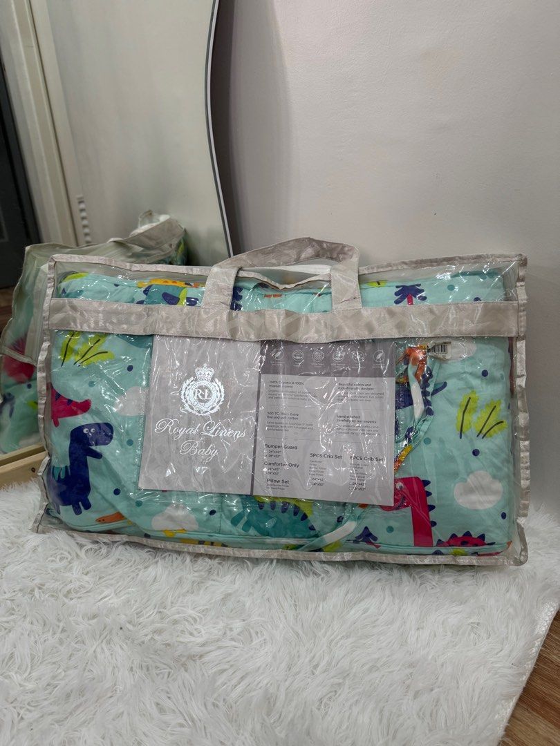 Royal Linens Baby Bumper Guard (Category: Bed Guards) located in Rizal. Submitted by christellebasilio (Listing ID 1381108502, Image 1). Description: 28x52 Has a rust stain from a battery operated toy (second photo) Comes with original bag.