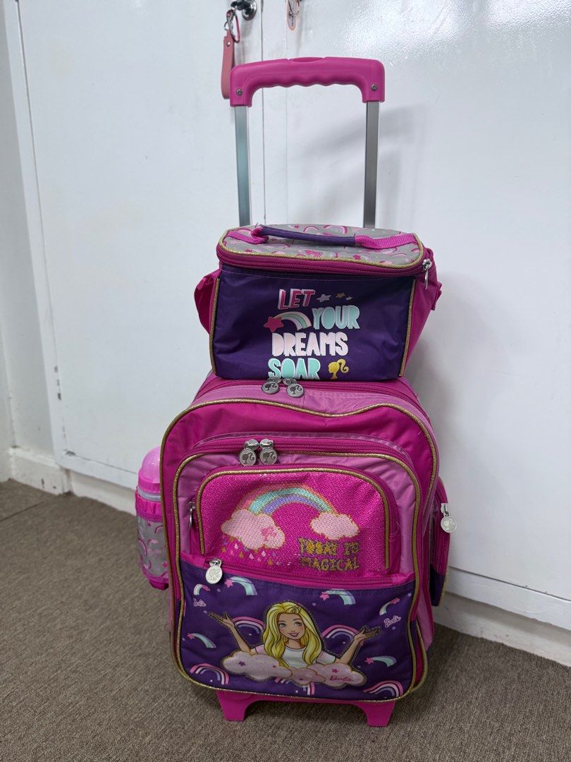 Stroller for kids (Category: Strollers) located in Manila. Submitted by thriftshop_mnl (Listing ID 1381117304, Image 2). Description: Used for just 4 months Original price: 3,900 Request: purchased a smaller bag Holds up to 7 books with its large capacity Includes bag cover and tumbler Comes with an insulated compartment for snacks Features sturdy wheels suitable for a stroller.