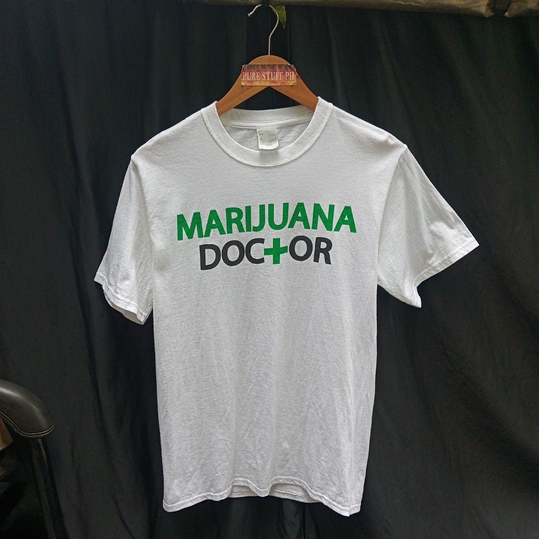 Weed shirt (Category: Tshirts & Polo Shirts ) located in Pili. Submitted by purestuffph (Listing ID 1381089259, Image 2). Description: Weed shirt by Port & Company size: small width: 17 length: 27 9+/10 condition and color rate 380 + shipping fee.