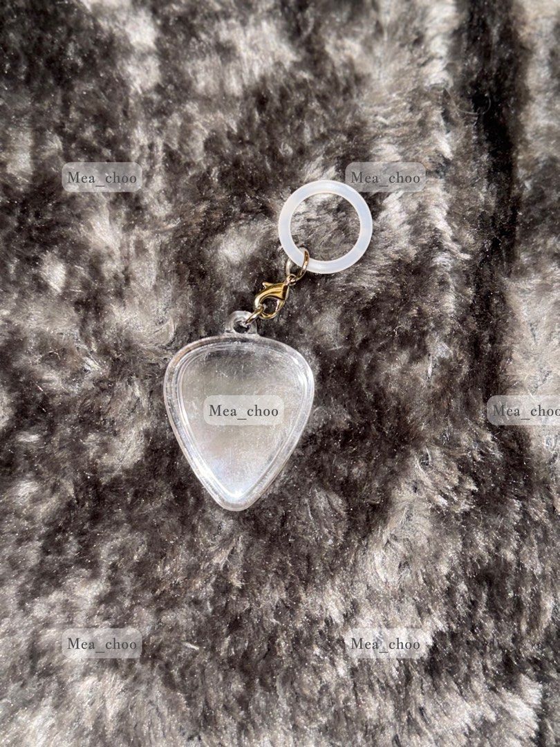 Acrylic Guitar Pick case with Ubermensch pouch (Category: Music Accessories) located in Las Pinas. Submitted by mea_choo (Listing ID 1381404119, Image 3). Description: Acrylic Guitar pick case with Ubermensch Pouch. Pick not included Can be purchased w/o pouch From Japan •You can add your favorite picks to make your own accessories. •Use it as a glass accessory, attach it to umbrella handle or attach cables, water bottles, pen lights, etc •Protec