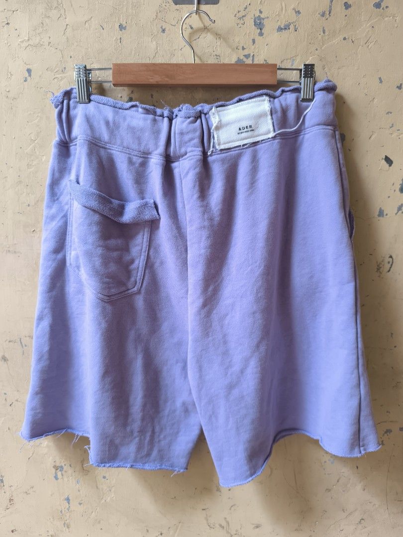 ADER ERROR SHORT (Category: Shorts) located in Cotabato. Submitted by sentimentalgoodz (Listing ID 1381322502, Image 2). Description: Ader Error Scratch Text Shorts Purple 9/10 CONDITION SIZE 32 LENGTH 21 AUTHENTIC.