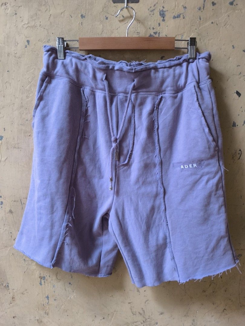 ADER ERROR SHORT (Category: Shorts) located in Cotabato. Submitted by sentimentalgoodz (Listing ID 1381322502, Image 1). Description: Ader Error Scratch Text Shorts Purple 9/10 CONDITION SIZE 32 LENGTH 21 AUTHENTIC.