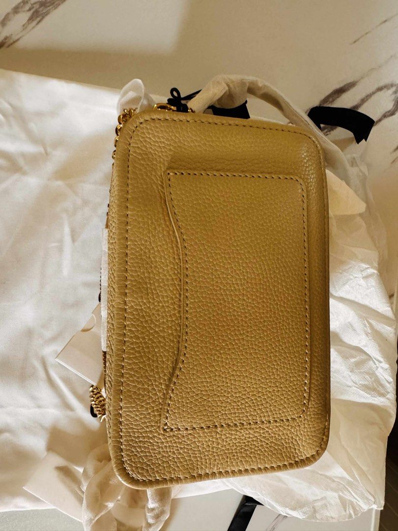 Authentic Marc Jacobs The Glam Shot Bag (Category: Luxury Bags & Wallets) located in Quezon City. Submitted by anbaksing (Listing ID 1381315347, Image 3). Description: Brand new authentic original Marc Jacobs The Glam Shot camera bag with chain Color: Beige with gold chain Motive: Monogram solid colour Composition: 100% pelle bovina Height: 13 cm Length: 21 cm Depth: 8 cm Shoulder Bag: 118 cm Bought from Qatar, please zoom in to see price tag. In