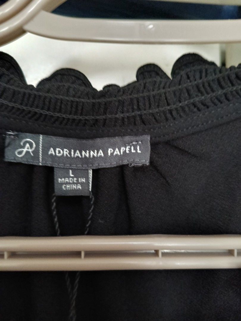 Black puff sleeve top (Category: Blouses) located in Quezon City. Submitted by coco_pet (Listing ID 1381367610, Image 2). Description: Brand new with tags.