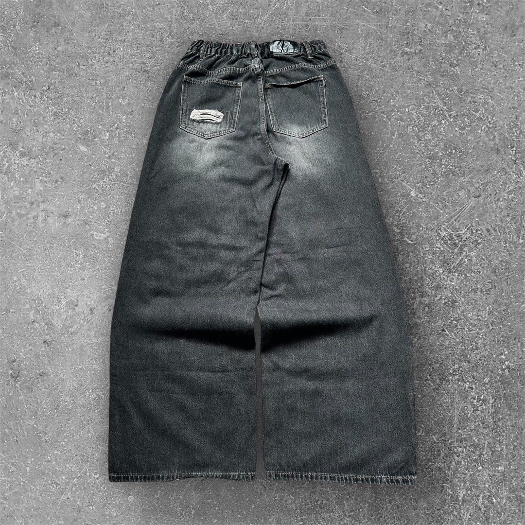 Distressed Washed Black Super Baggy Jeans (Category: Jeans) located in San Pedro. Submitted by karluash (Listing ID 1381424842, Image 2). Description: Waist: 30-32 inches Length: 43 inches Thighs: 14 inches Leg Opening: 12 inches Flaws: distressed hem .