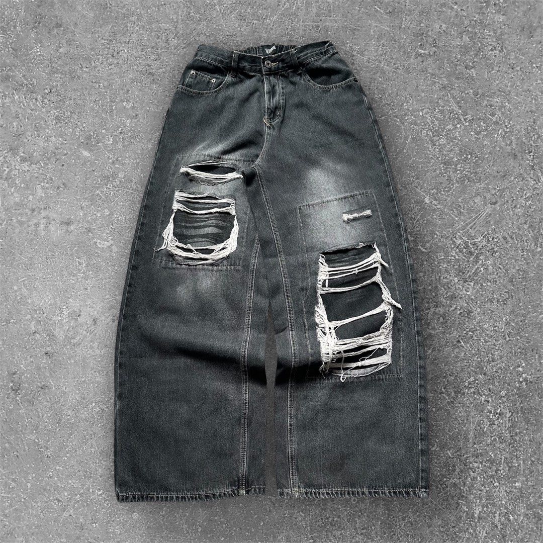 Distressed Washed Black Super Baggy Jeans (Category: Jeans) located in San Pedro. Submitted by karluash (Listing ID 1381424842, Image 1). Description: Waist: 30-32 inches Length: 43 inches Thighs: 14 inches Leg Opening: 12 inches Flaws: distressed hem .