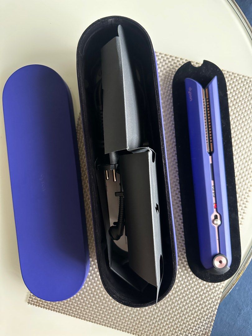 Dyson Corale hair straightener (Category: Hair) located in Makati City. Submitted by alina1990 (Listing ID 1381359675, Image 3). Description: Selling my Dyson Corale hair straightener. Bought in Paris in March 2023. Complete set. Note: standing dock does not charge, charging directly from the cord. Wireless use after full charge. Non wireless use while on charge also possible. Location: BGC.
