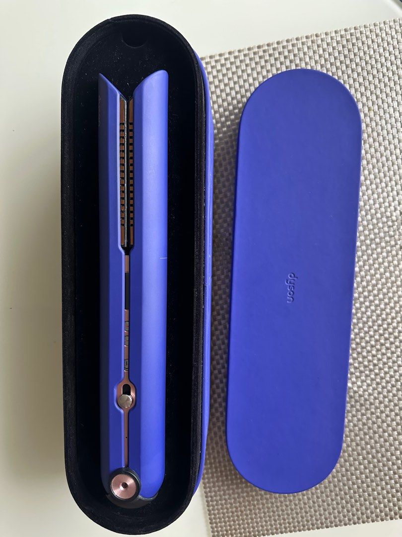 Dyson Corale hair straightener (Category: Hair) located in Makati City. Submitted by alina1990 (Listing ID 1381359675, Image 2). Description: Selling my Dyson Corale hair straightener. Bought in Paris in March 2023. Complete set. Note: standing dock does not charge, charging directly from the cord. Wireless use after full charge. Non wireless use while on charge also possible. Location: BGC.