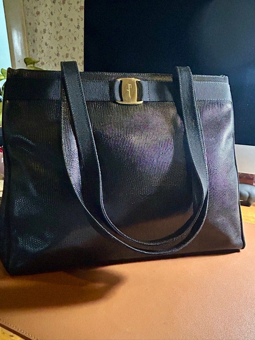 FERRAGAMO lizard skin tote (Category: Luxury Bags & Wallets) located in Quezon City. Submitted by asiaco (Listing ID 1381329017, Image 1). Description: Slightly used. Very nice for office as it fits your laptop. See pics for dimensions. Perfect for shopping bag too. Long handle is perfect for convenience. .