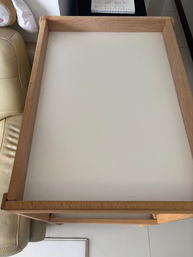 IKEA Changing Table (Category: Changing Tables & Stations) located in Singapore. Submitted by divinelife (Listing ID 1381462839, Image 2). Description: Includes the changing pad (some parts a bit deflated and comes with the cover). Features a shelf for storage. Solid wood frame. Clean and ready for use. Perfect for a nursery or baby's room. Use for 1year only baby has grown. Self-collected. .