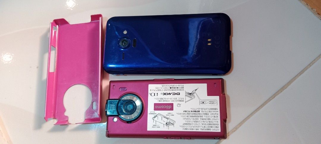 Japanese Android phone with issues take all (Category: Early Generation Mobile Phones) located in Bulacan. Submitted by Shoppe.Ups (Listing ID 1381303888, Image 3). Description: take all both japanese phones issues pink: missing battery untested blue: with password / vignette sa LCD screen selling as defective for display/ collection only what you see is what you get meetups: guiguinto plaridel bulacan - J&T *(Payment First) - LBC COP/COD *(payme