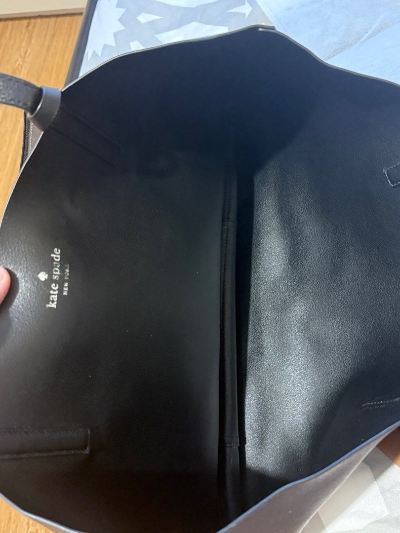 Kate Spade Arch Place Mya - Reversible Bag (Category: Tote Bags) located in Santo Tomas. Submitted by ella0726 (Listing ID 1381384083, Image 3). Description: Authentic; Bought in Europe Color: silver metallic / black Dimension: 12.4”h x 18.5”w x 6.3”d Drop length: 9” refined grain leather Unlined Open top tote Reversible Comes with removable pouch No dustbag .