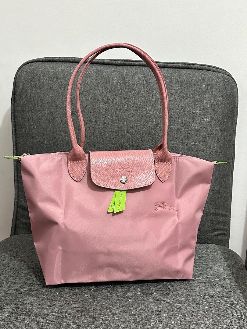 Longchamp Club Long Handle (Category: Luxury Bags & Wallets) located in Makati City. Submitted by lux.mariah (Listing ID 1381357575, Image 1). Description: 100% Authentic PETAL PINK color Medium size (Large also available) Brand new | Complete set • Care Card • Dustbag • Paperbag Layaway: 50% DP • 1.5 months Nationwide shipping Payment: GCash • BDO • Maya Courier: J&T • Lalamove.