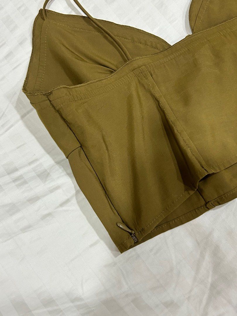 Olive Cropped Classy Sleeveless Strappy Top (Category: Sleeveless) located in Las Pinas. Submitted by ookaythrift (Listing ID 1381412782, Image 3). Description: size small on tag but fits medium well : ) dm me for exact measurements. such a pretty top but doesn’t fit me anymore 🥲 feel free to inquire thru pm!.