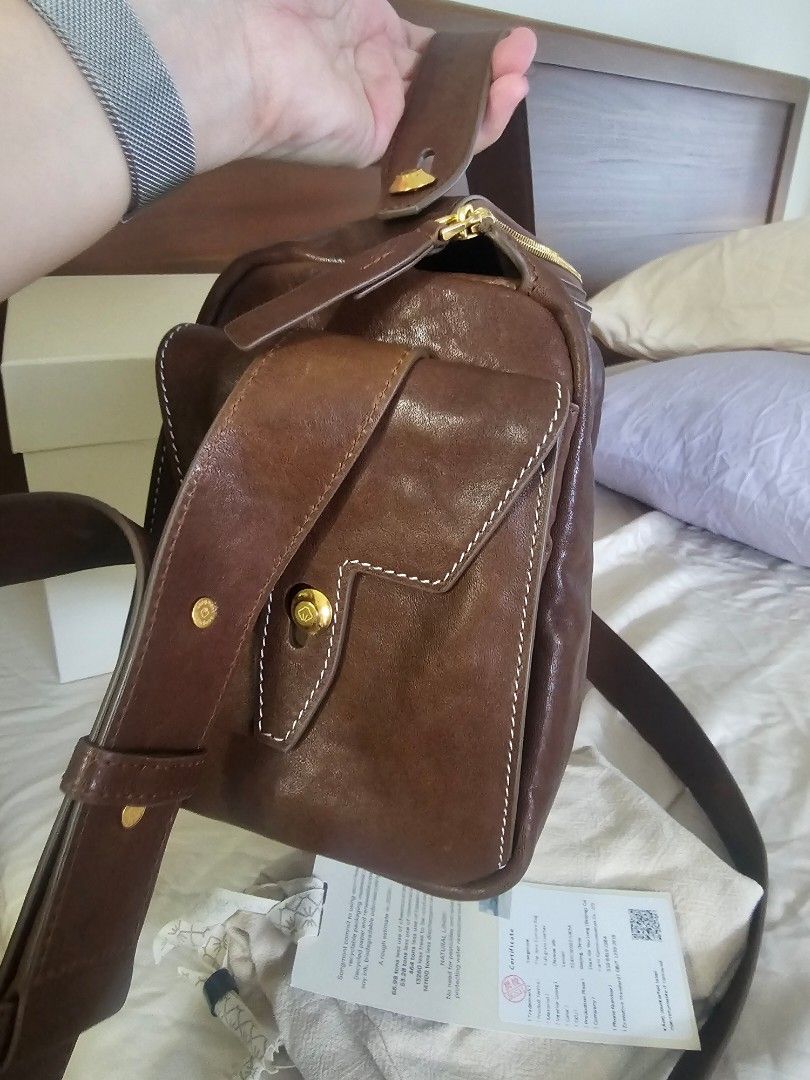 Songmont Yore Camera Bag (Category: Luxury Bags & Wallets) located in Taguig. Submitted by riello (Listing ID 1381355004, Image 2). Description: brand new price is 30k, guaranteed original bought last year from official songmont website. no flaws but minimal signs of use. - Material: Vegetable-Tanned Leather - Interior Lining: Fabric - Hardware: 304 Stainless Steel Vacuum Electroplated Hardware - Dimension: L 30cm/11.81" * W 13cm/5.12" * H 17cm/6