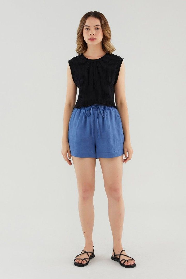 The Editors Market (TEM) Alyra Knit Top - Black and White (Category: Sleeveless) located in Singapore. Submitted by hannahlsh (Listing ID 1381300398, Image 1). Description: - Sleeveless ribbed top - Available in black and white - 1 for $18, 2 for $30 - Crew neck - Flattering fit - Perfect for layering or wearing alone - Suitable for casual and semi-formal occasions - Comfortable and versatile.