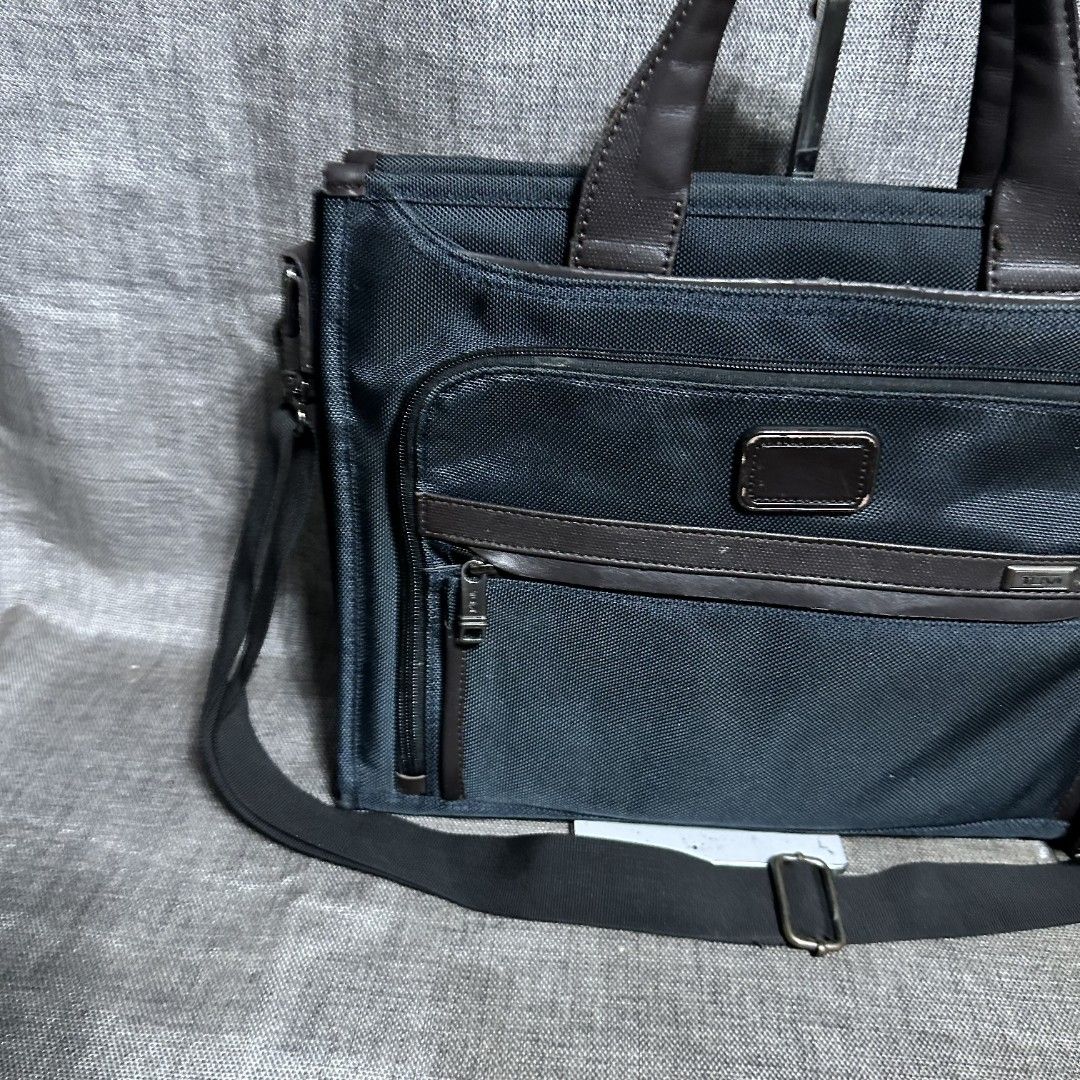 Tumi Alpha bravo bag (Category: Luxury Bags & Wallets) located in Manila. Submitted by greyinfash06839 (Listing ID 1381455874, Image 2). Description: 🤍Item: Tumi Alpha bravo bag 🤍Brand: Tumi 🤍Matirial: Nylon 🤍Quality: Original 🤍color: Blue 🤍Size: Large 🤍Dimension. H: 12 L: 16 W: 3 🤍Sex: For Men 🤍Issue: Sign of use 🤍Condition Rate: 9/10 🤍Other info:.