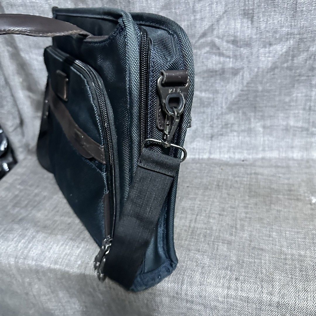 Tumi Alpha bravo bag (Category: Luxury Bags & Wallets) located in Manila. Submitted by greyinfash06839 (Listing ID 1381455874, Image 3). Description: 🤍Item: Tumi Alpha bravo bag 🤍Brand: Tumi 🤍Matirial: Nylon 🤍Quality: Original 🤍color: Blue 🤍Size: Large 🤍Dimension. H: 12 L: 16 W: 3 🤍Sex: For Men 🤍Issue: Sign of use 🤍Condition Rate: 9/10 🤍Other info:.