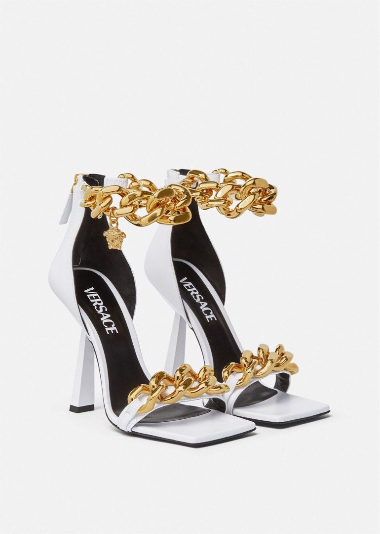 VERSACE MEDUSA CHAIN HIGH HEELS SANDALS (Category: Sneakers & Footwear) located in Pasay City. Submitted by slashed (Listing ID 1381319089, Image 1). Description: PRELOVED USED (Twice) no box Description Set on a high stiletto heel, these leather sandals are enriched with a Medusa charm on the ankle strap and feature a chunky chain detail on the toe strap. DETAILS & CARE - Medusa hardware - Square toe - High heel - Outer fabric: 100% Nappa leathe