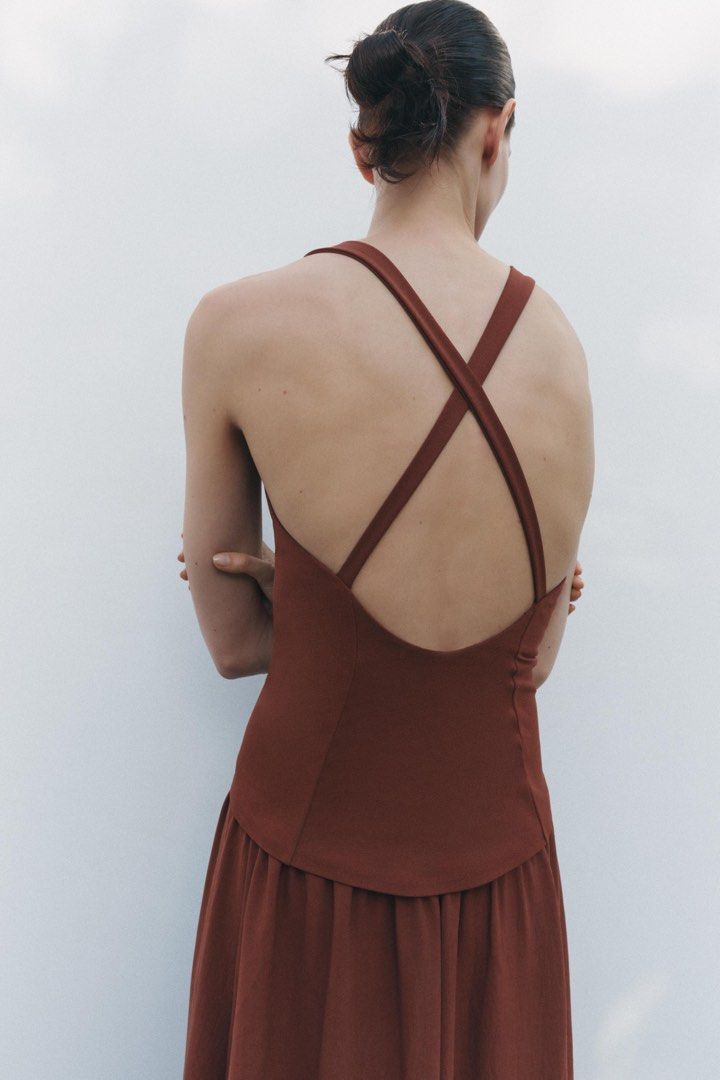 ZARA brown midi dress (Category: Dresses) located in Quezon City. Submitted by francesdaph (Listing ID 1381430882, Image 2). Description: ZARA MIDI DRESS (BROWN) Plunging V neck with crossover strap -Used twice - can fit small to medium (too big for xs).