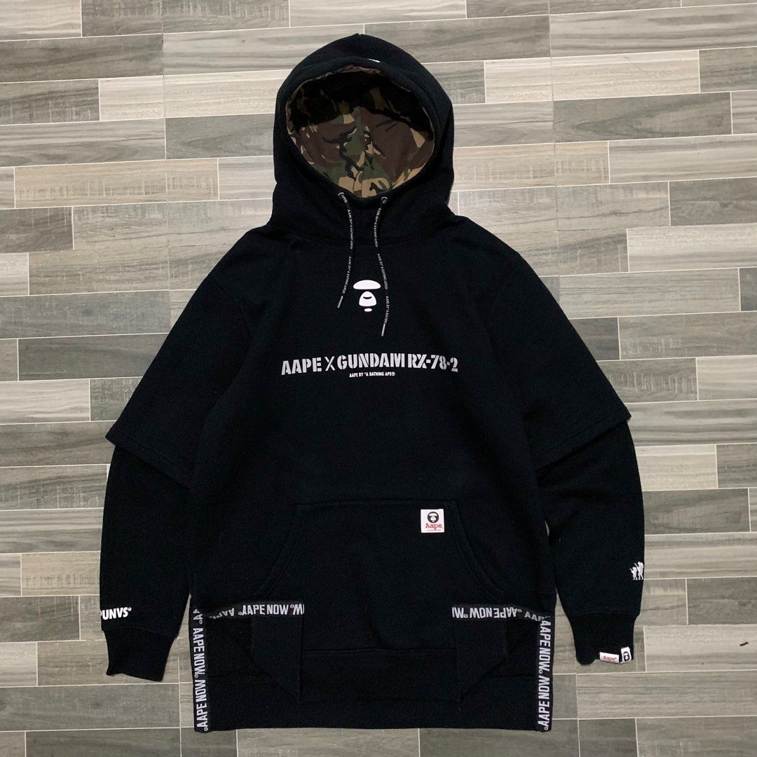 Authentic AAPE x Gundam Hoodie Jacket Black (Category: Hoodies) located in Baguio. Submitted by themgarbage (Listing ID 1381579063, Image 1). Description: Condition:Excellent Size tagged:L Width:22 Length:30.