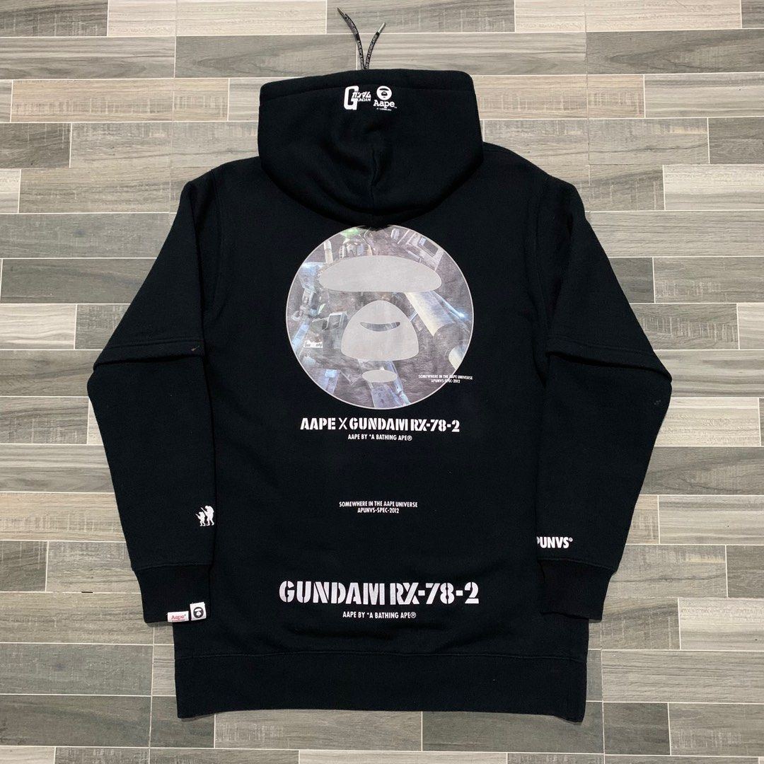 Authentic AAPE x Gundam Hoodie Jacket Black (Category: Hoodies) located in Baguio. Submitted by themgarbage (Listing ID 1381579063, Image 2). Description: Condition:Excellent Size tagged:L Width:22 Length:30.