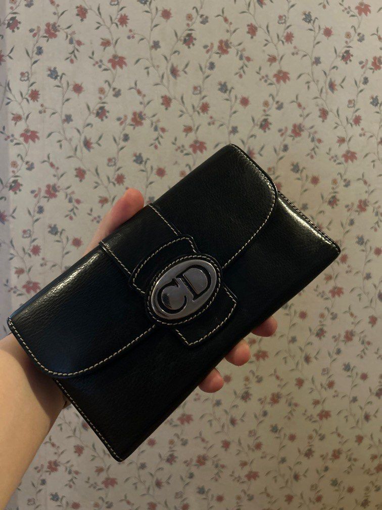 Christian Dior logo leather wallet (Category: Luxury Bags & Wallets) located in Quezon City. Submitted by asiaco (Listing ID 1339768493, Image 1). Description: CD logo very nice leather wallet. Replaced plastic compartment for id slot. .