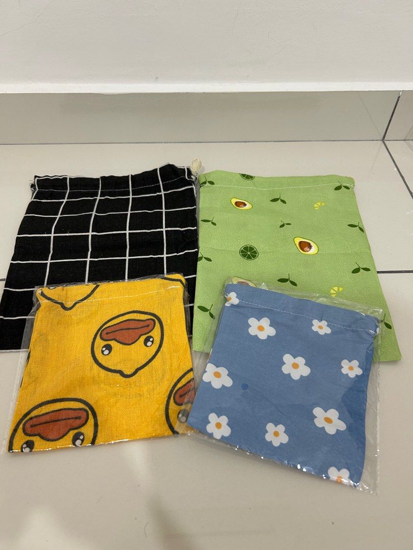Drawstring Pouch (Bundle) (Category: Purses & Pouches) located in Singapore. Submitted by jasminetwx (Listing ID 1381477908, Image 2). Description: I have 4 drawstring pouch with different design and 2 sizes Material: Cotton Linen Small size: 14cm x 16cm Medium size: 20cm x 25cm $2-3 each and $7 in total if taking all of them..
