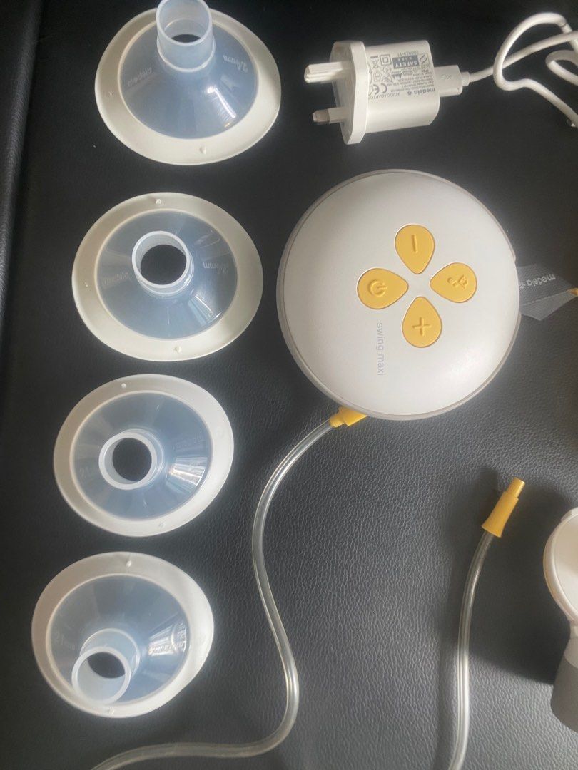 Medela Swing Maxi Breastpump + Freebies (Category: Breastfeeding & Bottle Feeding) located in Kuala Lumpur. Submitted by anotherone12 (Listing ID 1381529851, Image 2). Description: Very convenient to use and in very good condition. Must have for working mums. Freebies: 1 extra Medela bottle included (total 3 bottles) 1 pair extra Flanges included (total 2 pairs of flanges - 21mm and 24mm) 2 Hakka suction pumps Silicon spoons, tommy tippy bottle f