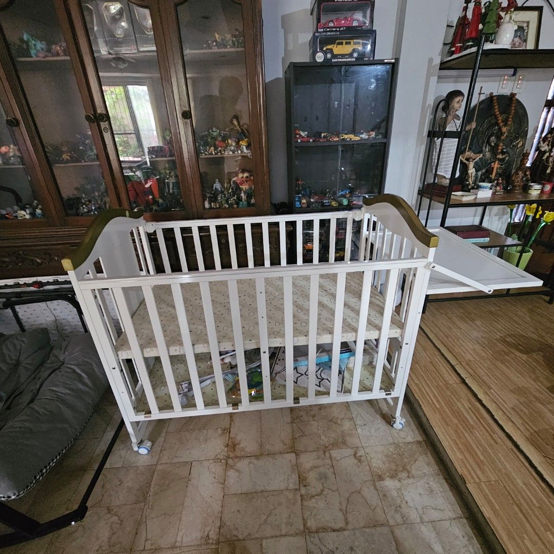 MULTIFUNCTIONAL 10 in 1 crib ‼️ (Category: Cots & Cribs) located in Quezon City. Submitted by pablopenalbaii24 (Listing ID 1381637289, Image 1). Description: MULTIFUNCTIONAL 10 in 1 crib ‼️ *Taylor white crib made in pine wood material with wheels rocking crib can be converted into bed big storage with changing diaper free foam only free mosquito net with stand Bought for 11,500.