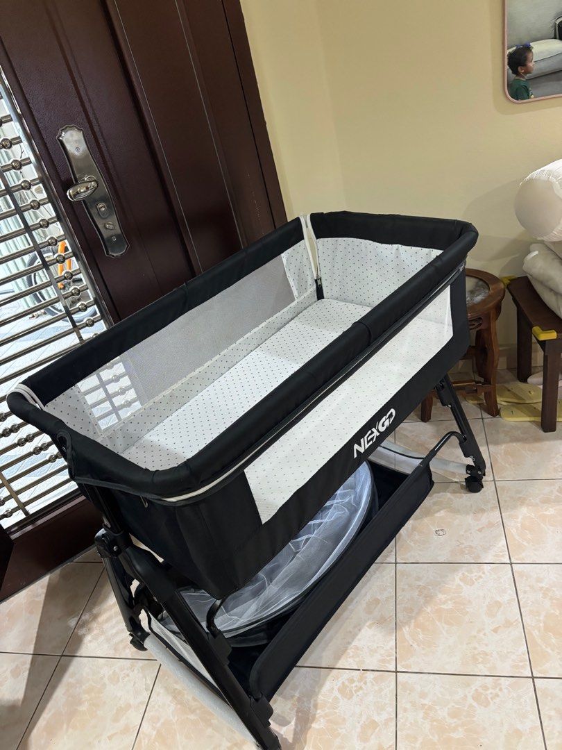 Nexgo Baby Crib co-sleep portable bed (Category: Cots & Cribs) located in Kuala Lumpur. Submitted by hzwnihadi (Listing ID 1381558887, Image 2). Description: Only used for few months. .