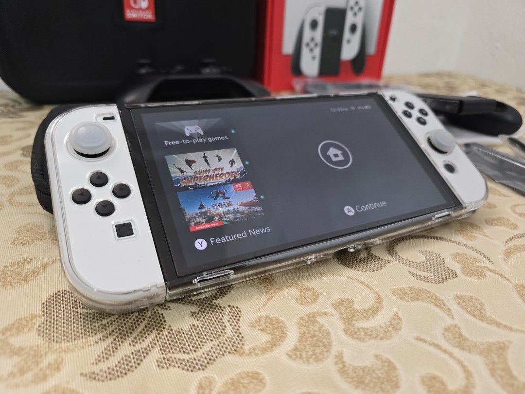 Nintendo Switch OLED White Console Bundle63107700673538111