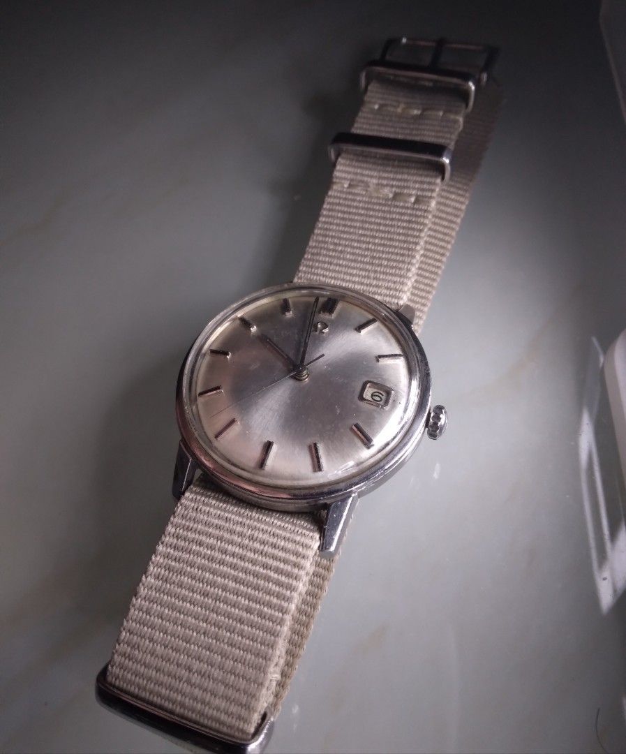Omega Seamaster Deville,w/ original metal strap (Category: Luxury Watches) located in Makati City. Submitted by epictiger. (Listing ID 1381640787, Image 1). Description: All original Omega Seamaster. With original metal strap. Owner seller, very good working condition..