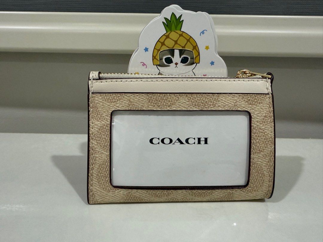 Original Coach ID Case - Signature Denim (Category: Luxury Bags & Wallets) located in San Juan City. Submitted by beyondtherack (Listing ID 1381629279, Image 2). Description: Mini Skinny ID Case in Signature Denim.