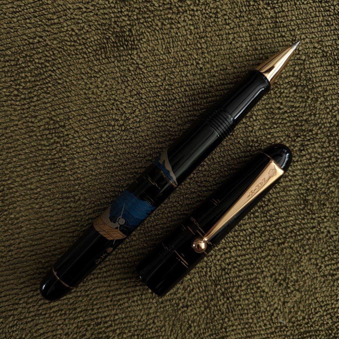 Pilot Namiki Urushi Lacquer Nippon Art Hira Makie Rollerball Pen - Mount/Mt. Fuji and Ship (Category: Other Stationery & Craft) located in Singapore. Submitted by femscout (Listing ID 1381493991, Image 3). Description: 🔹Condition: Like New 🔹New Pelikan refill inserted (Black, 0.7mm) 🔹Pen accepts Pilot GLB 7, Pilot G2 and Pelikan 338 refills 🔸Meetups: Kaki Bukit MRT (DT28) 🔵 Kembangan MRT (EW6) 🟢 Marine Terrace MRT (TE27) 🟤 🔸Complimentary 