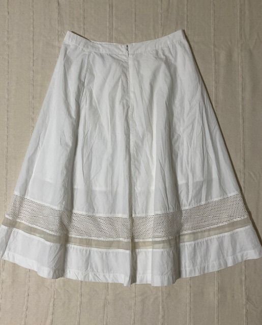 Pre-loved Authentic Initial Fashion Skirt Size Small (Category: Skirts) located in Paranaque City. Submitted by vanitelab (Listing ID 1381581676, Image 2). Description: Pre-loved Authentic Initial Fashion Skirt (HongKong brand) with Side Pockets SUPER NICE IN GOOD CONDITION Product Information: • Size: Small • Color: White • Measurement when laid flat: waist - 13.5 x 2 inches length - 25 inches • Material: Cotton, Polyester Will appreciate receiv