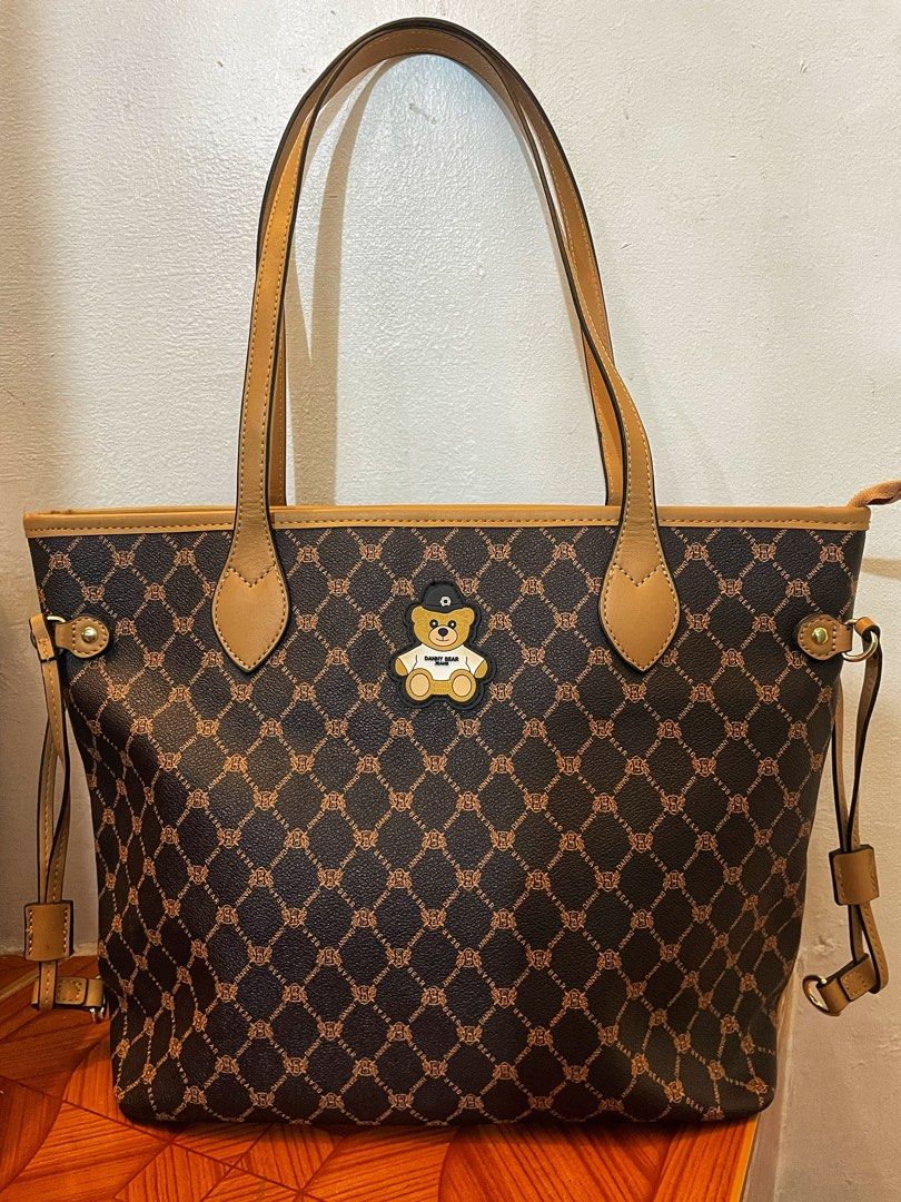 Sale‼️Orig Danny bear (Category: Luxury Bags & Wallets) located in Manila. Submitted by battousai31 (Listing ID 1381612525, Image 1). Description: Sale‼️₱999 Orig Danny bear tote💕 Like new pwede pang regalo walang issue. Size: 15inch lapad at 11inch haba large tote Available unless mark as sold** ➡️MOP: Gcash ➡️Can do: shope but checkout only, lalamove accepting lalamove COD, grab,toktok, mrspeedy ➡️Loc. Bacoor Cavite ➡️Note: Buyer will handle s