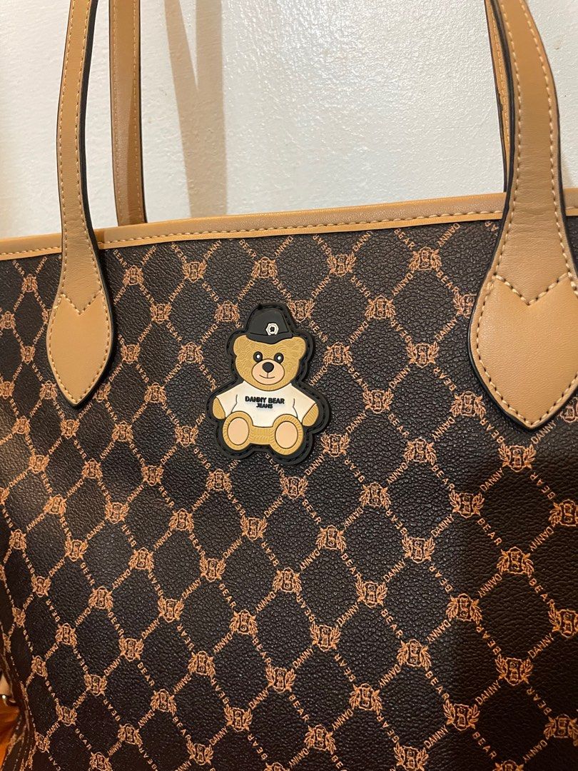 Sale‼️Orig Danny bear (Category: Luxury Bags & Wallets) located in Manila. Submitted by battousai31 (Listing ID 1381612525, Image 3). Description: Sale‼️₱999 Orig Danny bear tote💕 Like new pwede pang regalo walang issue. Size: 15inch lapad at 11inch haba large tote Available unless mark as sold** ➡️MOP: Gcash ➡️Can do: shope but checkout only, lalamove accepting lalamove COD, grab,toktok, mrspeedy ➡️Loc. Bacoor Cavite ➡️Note: Buyer will handle s