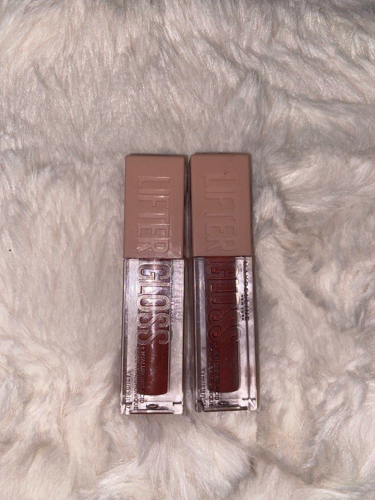 Take All Maybelline Lifter Gloss (Moon and Silk) (Category: Makeup) located in Quezon City. Submitted by evlinc (Listing ID 1381650189, Image 1). Description: RFS: didnt rllt like the colors, OG PRICE FOR BOTH: 650 💵 Payment : Gcash 🛵 Delivery : Lalamove/Jnt.