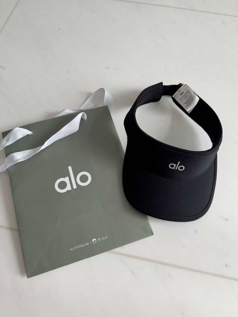 Alo Yoga SunVisor - Black (Category: Activewear) located in Singapore. Submitted by angelasue (Listing ID 1378230219, Image 3). Description: Alo yoga performance eclipse visor Like new Alo Yoga visor in black. Features the Alo logo on the front. Comes with the original Alo bag. Perfect for workouts or everyday wear. Adjustable strap for a comfortable fit..