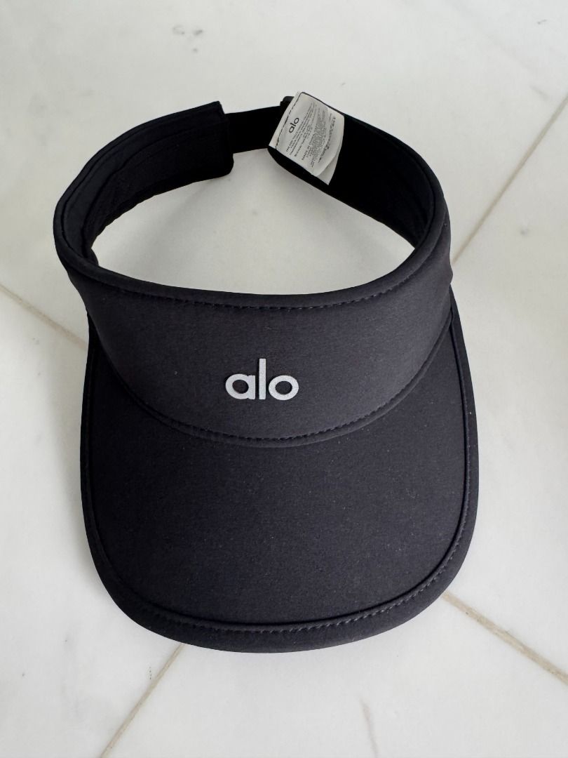 Alo Yoga SunVisor - Black (Category: Activewear) located in Singapore. Submitted by angelasue (Listing ID 1378230219, Image 1). Description: Alo yoga performance eclipse visor Like new Alo Yoga visor in black. Features the Alo logo on the front. Comes with the original Alo bag. Perfect for workouts or everyday wear. Adjustable strap for a comfortable fit..