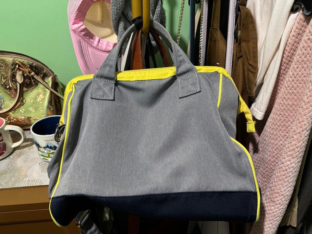 Anello Three-toned Medium bag (Category: Cross-body Bags) located in Makati City. Submitted by jinger_21 (Listing ID 1378262750, Image 3). Description: Excellent condition With strap Three-toned- gray, blue and yellow Size- medium Price- Php 1,800 fixed) plus SF Mode of payment: Gcash Maya GoTyme Payment first before shipout Shipping fee will be shouldered by the buyer.