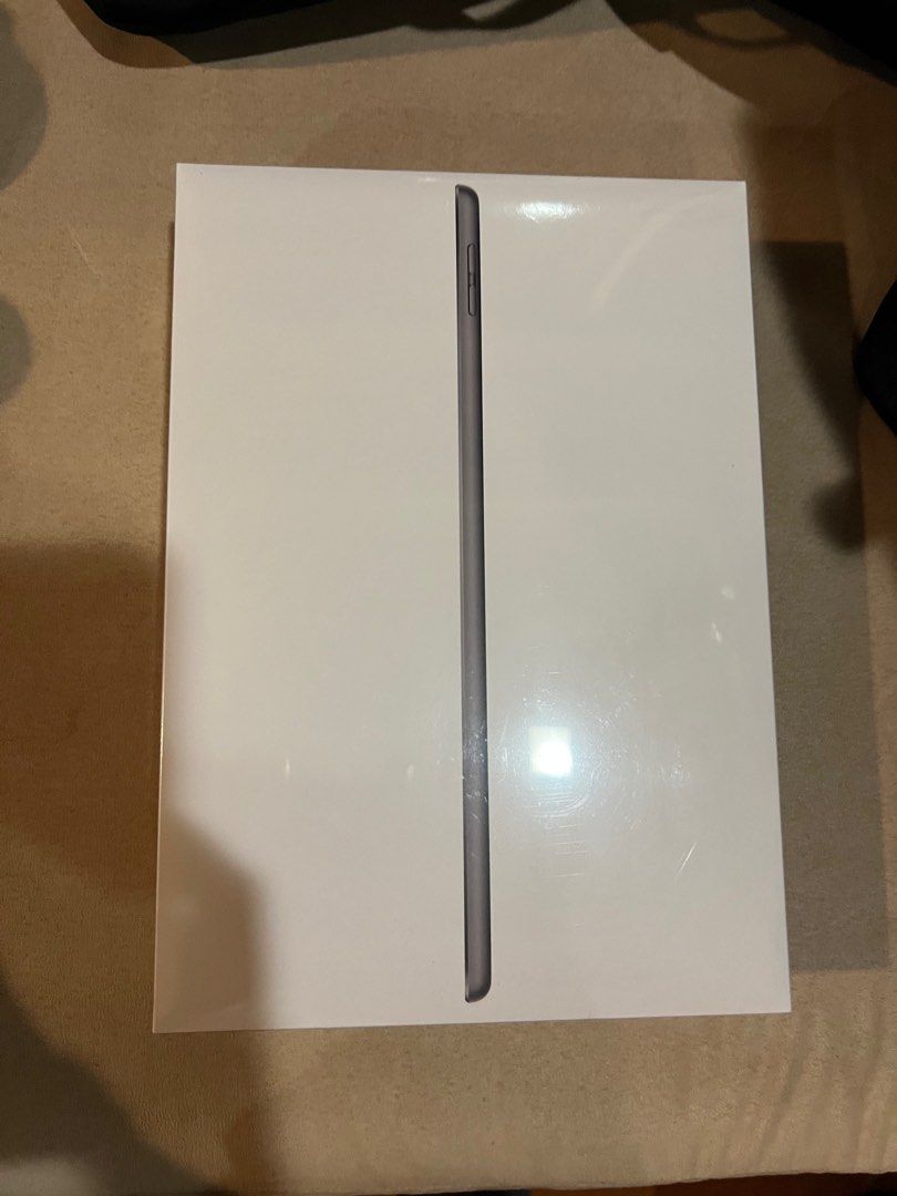 (Category: iPad) located in Singapore. Submitted by angela55 (Listing ID 1378269262, Image 1). Description: Brand new, sealed Apple iPad (9th Generation) in Space Gray. Perfect for work or entertainment. Comes in original packaging. Received as gift..