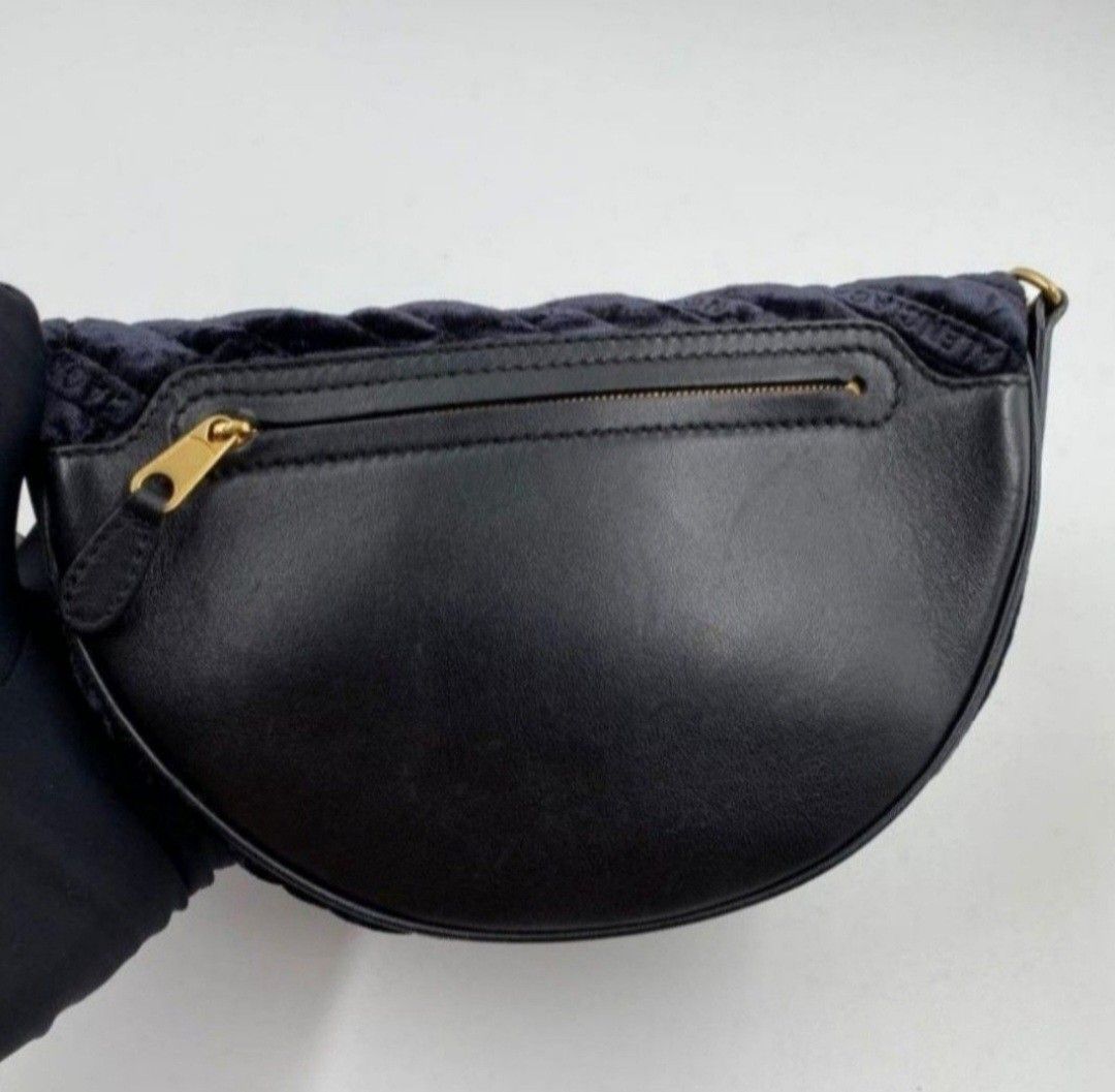 Balenciaga Black Velvet Crossbody Belt Bag & Graffiti Bazaar Bag (Category: Bags & Wallets) located in Singapore. Submitted by dancing_queen10 (Listing ID 1378285015, Image 3). Description: Pristine Condition! Price further reduced to declutter. Comes with dustbag only No receipt Adjustable leather strap Size: 25x15cm Also selling my Balenciaga Graffiti Bazaar Bag for $760 Very good condition Adjustable strap. 18x16x8cm Do see my other listing. ➡