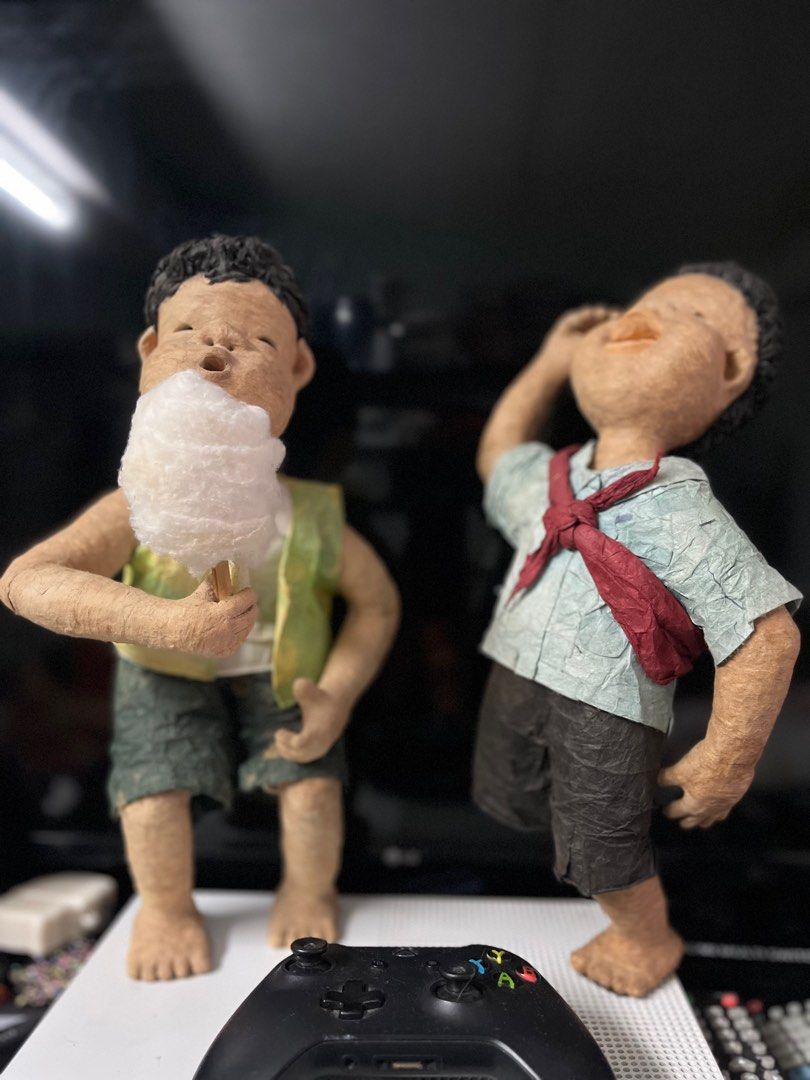 Boys paper mache 14inches (Category: Figurines & Statues) located in Angeles City. Submitted by goodbuysathome (Listing ID 1378217269, Image 1). Description: Two young boys paper mache 14 inches height From Korea For educational use Pwede display s classroom /art project Lp posted Add sf 79 with box p kse jnt GCash payment .