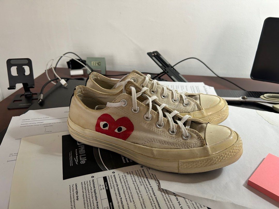 CDG Converse (Authentic) (Category: Sneakers) located in Quezon City. Submitted by argomda (Listing ID 1378185742, Image 3). Description: Selling my used CDG converse Size 7 MENS Absolutely authentic or your money back; Purchased in HK for around 9k 6/10 condition; What you see is what you get. Honest issue: some parts of the sole have superglue due to beginning sole separation; damaged/faded size tag Location: Scout Chuatoco QC.