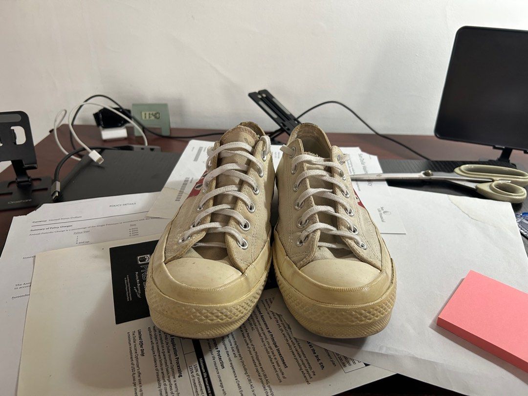 CDG Converse (Authentic) (Category: Sneakers) located in Quezon City. Submitted by argomda (Listing ID 1378185742, Image 2). Description: Selling my used CDG converse Size 7 MENS Absolutely authentic or your money back; Purchased in HK for around 9k 6/10 condition; What you see is what you get. Honest issue: some parts of the sole have superglue due to beginning sole separation; damaged/faded size tag Location: Scout Chuatoco QC.
