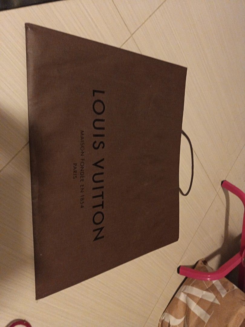 Designer Shopping Bags - Louis Vuitton, Gucci, Chanel, etc. Paper bags (Category: Bags & Wallets) located in Singapore. Submitted by amyhor (Listing ID 1378275886, Image 1). Description: - Designer paper bag collection - Brands include: Louis Vuitton, Gucci, Chanel, Ferragamo, Coach, Montblanc, Moschino, Tory Burch, and others - All bags in good condition - Perfect for collectors or gifting - various price.
