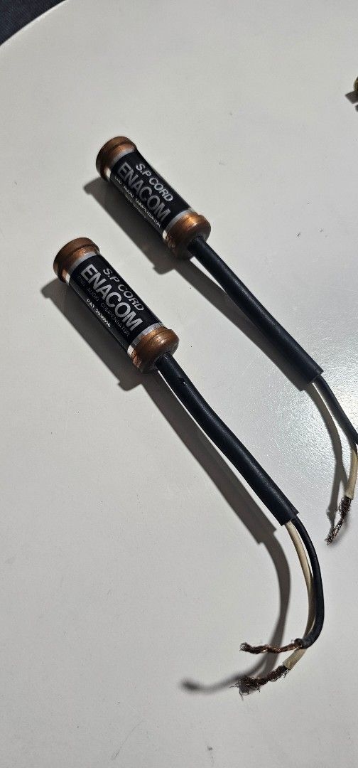 Enacom Enokido Speaker Cable Terminator (Category: Other Audio Equipment) located in Singapore. Submitted by fooys (Listing ID 1378159128, Image 2). Description: - Enhances audio quality. - Removes ringing distortion. - Results in a smoother, refined sound. - Enacom Enokido brand. - Limited availability..