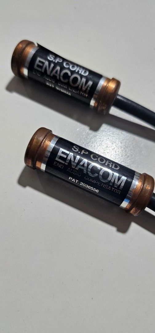 Enacom Enokido Speaker Cable Terminator (Category: Other Audio Equipment) located in Singapore. Submitted by fooys (Listing ID 1378159128, Image 1). Description: - Enhances audio quality. - Removes ringing distortion. - Results in a smoother, refined sound. - Enacom Enokido brand. - Limited availability..